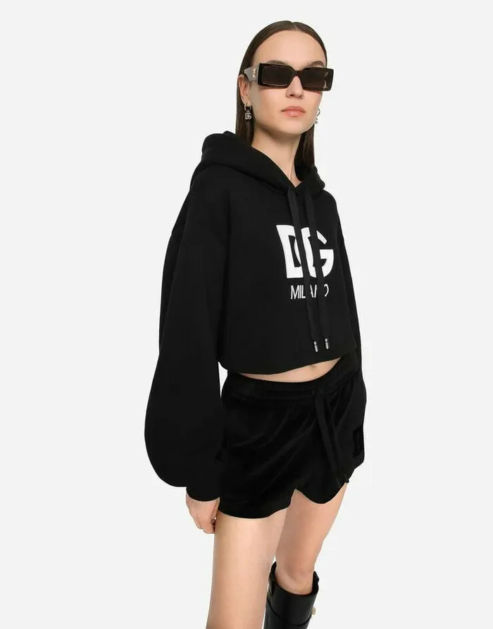 Dolce and Gabbana TShirts And Sweatshirts Women Cropped Jersey Hoodie With Embroidered DG Patch Black Dolce and Gabbana TShirts And Sweatshirts Women Cropped Jersey Hoodie With Embroidered DG Patch Black