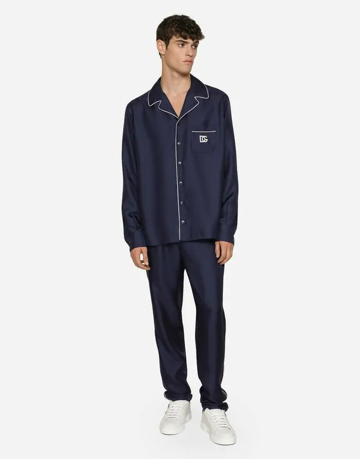 Dolce and Gabbana Trousers And Shorts Men Silk Jogging Pants With DG Embroidered Patch Blue Dolce and Gabbana Trousers And Shorts Men Silk Jogging Pants With DG Embroidered Patch Blue