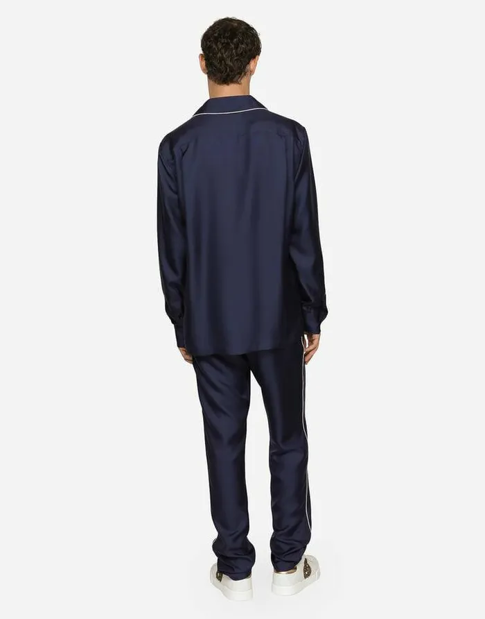 Dolce and Gabbana Trousers And Shorts Men Silk Jogging Pants With DG Embroidered Patch Blue Dolce and Gabbana Trousers And Shorts Men Silk Jogging Pants With DG Embroidered Patch Blue
