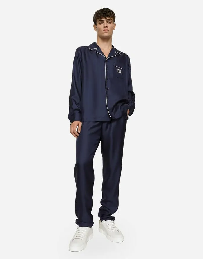Dolce and Gabbana Trousers And Shorts Men Silk Jogging Pants With DG Embroidered Patch Blue Dolce and Gabbana Trousers And Shorts Men Silk Jogging Pants With DG Embroidered Patch Blue